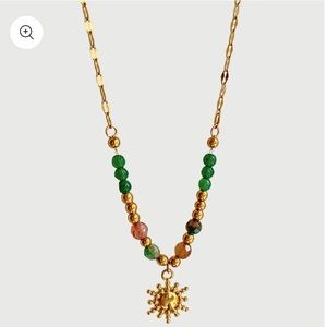 Brand new beaded necklace with sun pendant